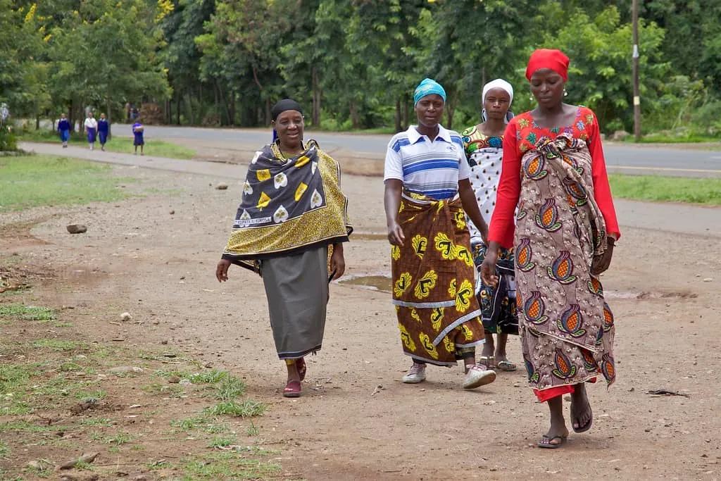 Tanzanian women dressed in traditional conservative clothing