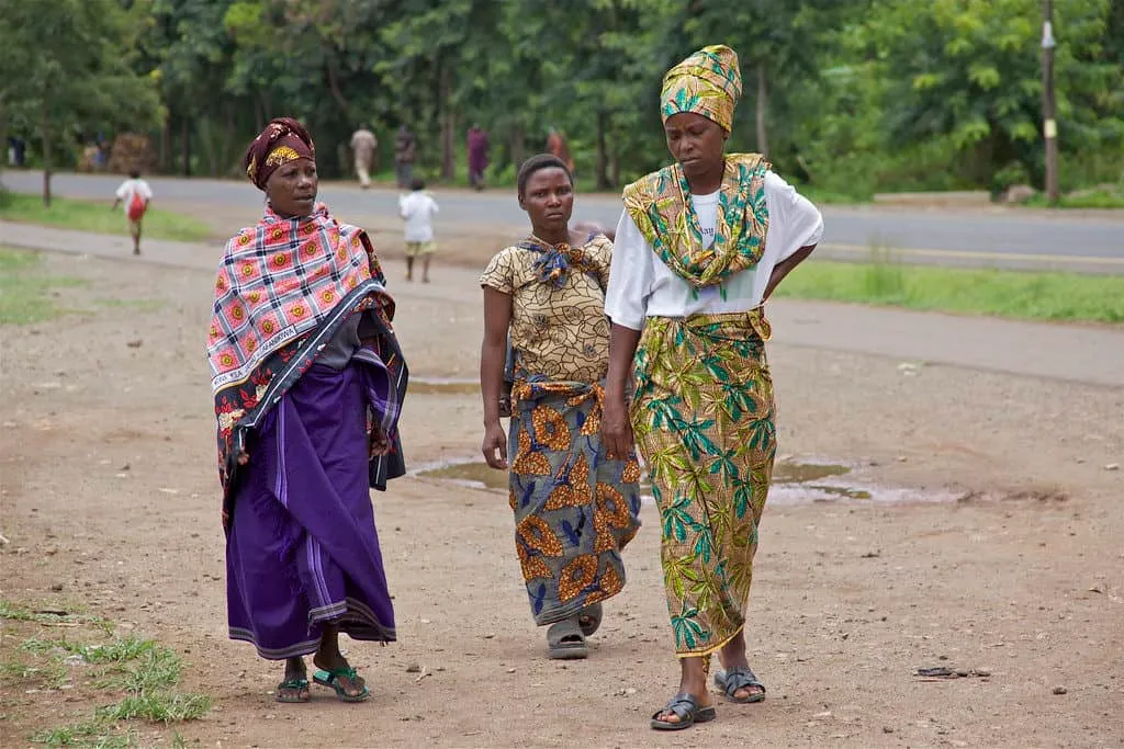 Women in Zanzibar wearing traditional Kanga dresses, reflecting the island's conservative dress culture